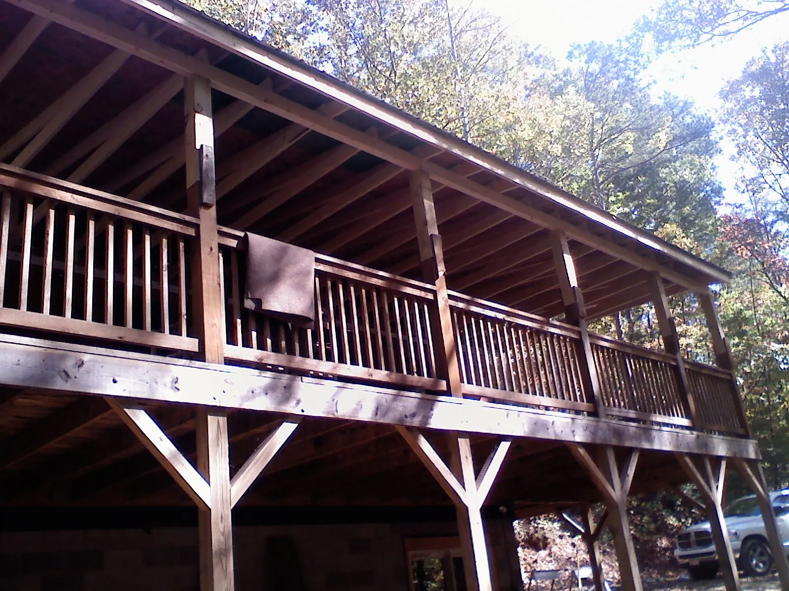 Timber framing under a new elevated porch and deck — Roof Leak Repair in Port Byron by Roofing Brothers